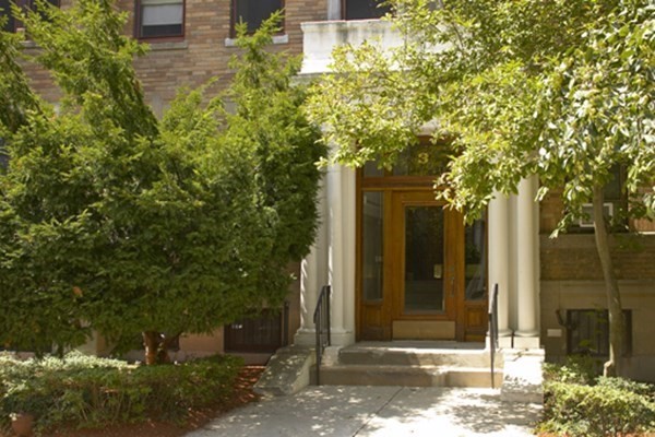 3 Crawford Street, Unit 9 Cambridge, MA 02139 - Photo 2 of 23 a front view of a house with a yard