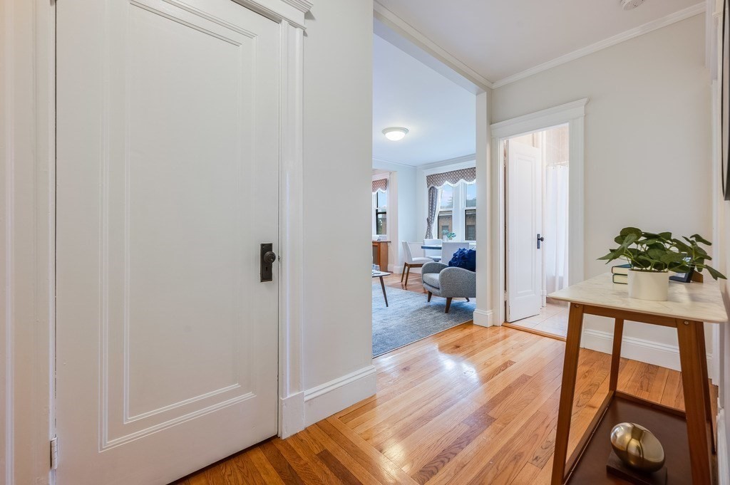 3 Crawford Street, Unit 9 Cambridge, MA 02139 - Photo 4 of 23 a living room with furniture and a table
