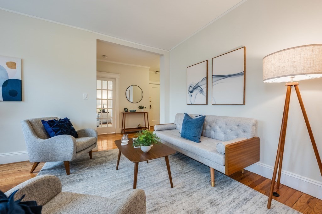 3 Crawford Street, Unit 9 Cambridge, MA 02139 - Photo 7 of 23 a living room with furniture and a rug