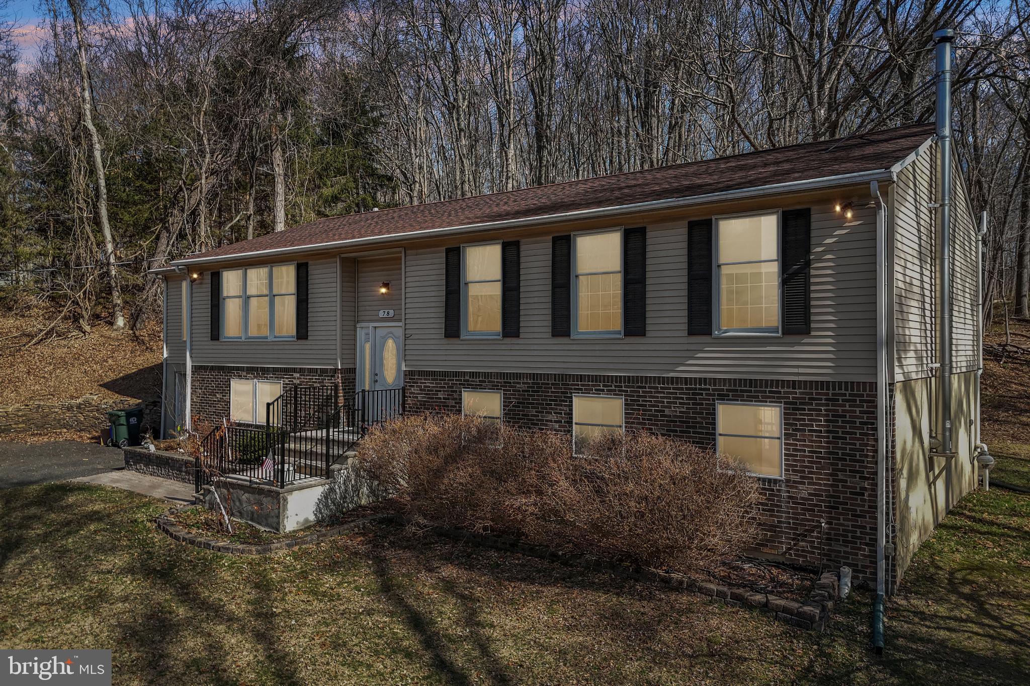 78 Rising Sun Tavern Road Millstone Township, NJ 08510 - Photo 1 of 55 a front view of a house with balcony
