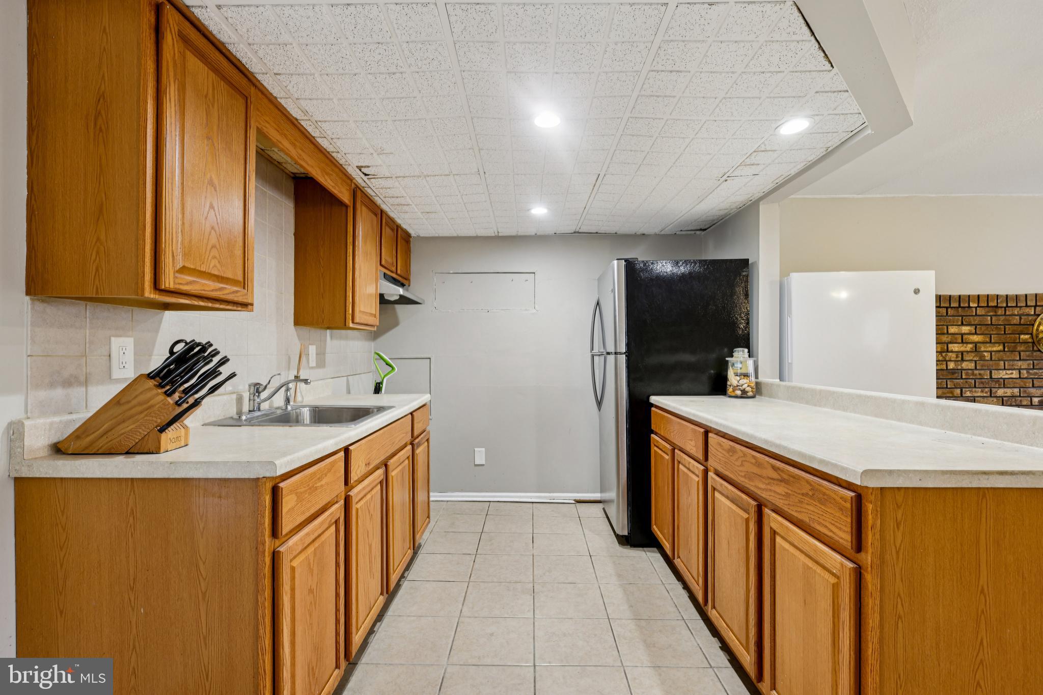78 Rising Sun Tavern Road Millstone Township, NJ 08510 - Photo 17 of 55 a kitchen that has a sink and a stove