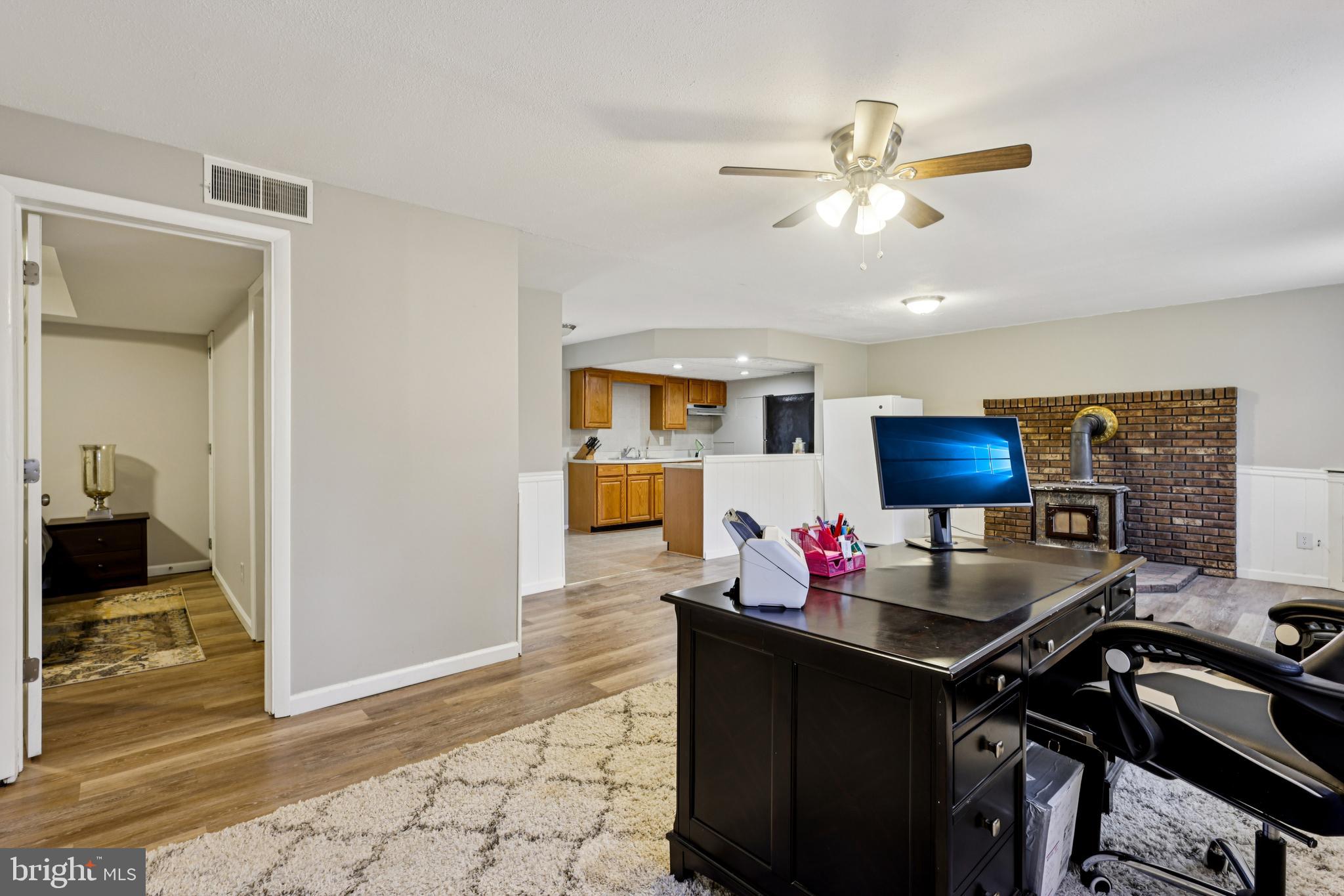 78 Rising Sun Tavern Road Millstone Township, NJ 08510 - Photo 20 of 55 a table and a workspace with furniture