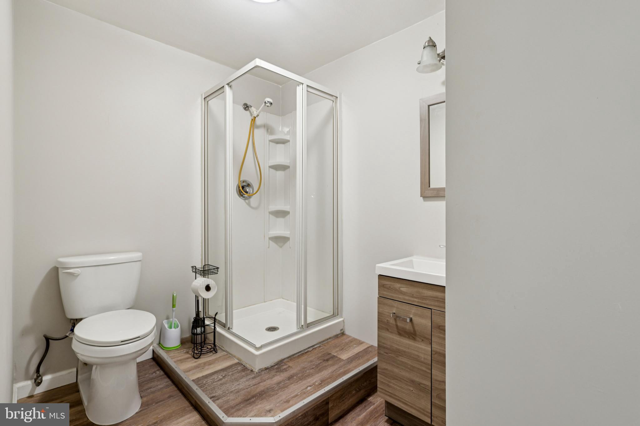 78 Rising Sun Tavern Road Millstone Township, NJ 08510 - Photo 21 of 55 a bathroom with a shower a toilet and a window