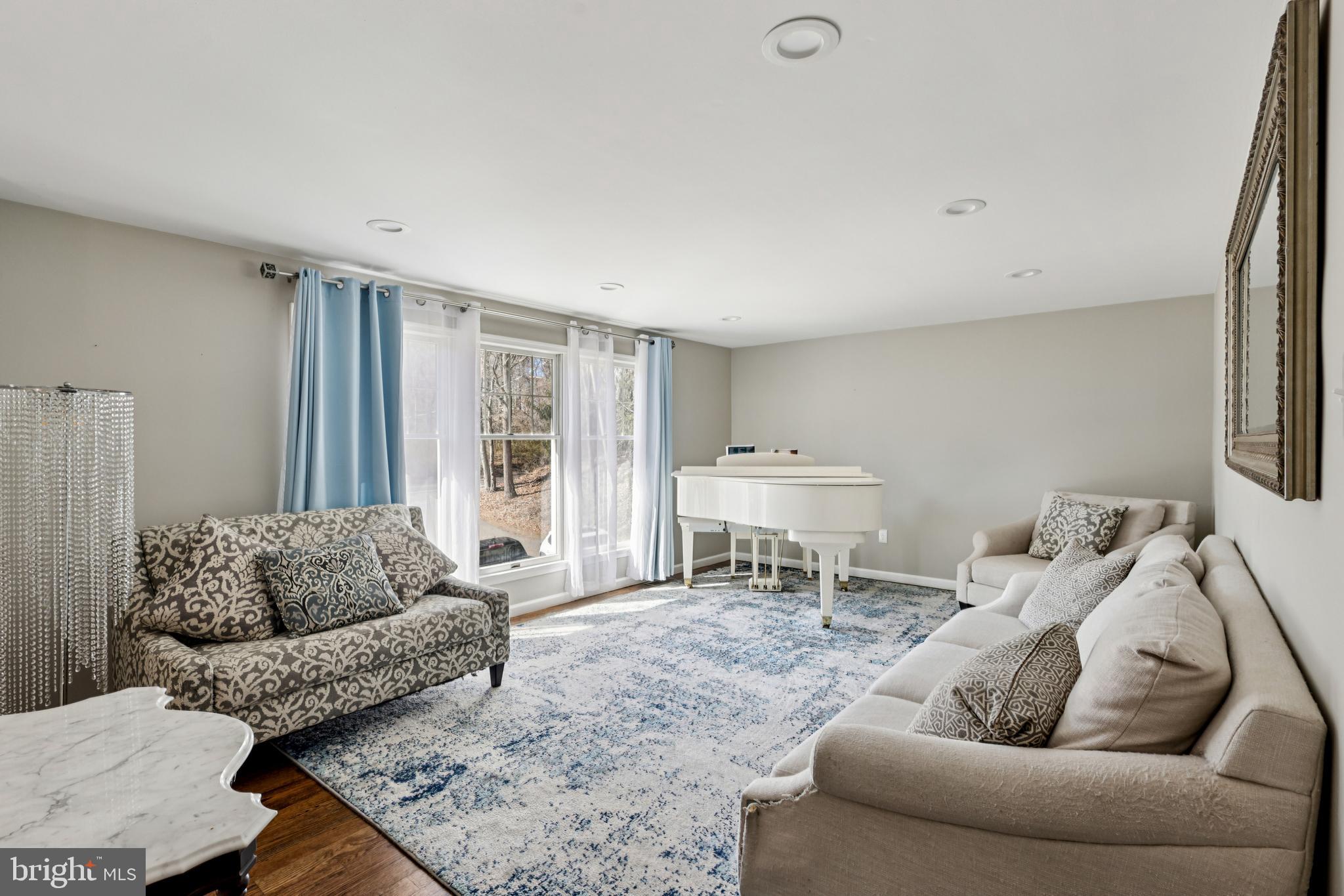 78 Rising Sun Tavern Road Millstone Township, NJ 08510 - Photo 23 of 55 a living room with furniture and a large window
