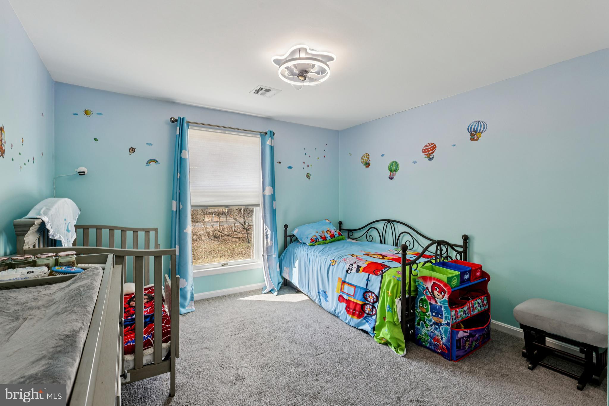 78 Rising Sun Tavern Road Millstone Township, NJ 08510 - Photo 24 of 55 a bedroom with a bed and a tv