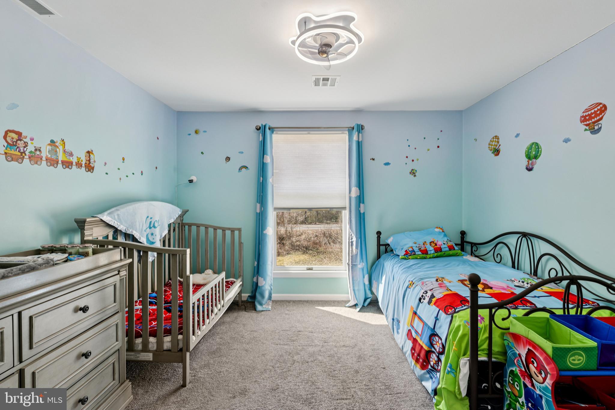 78 Rising Sun Tavern Road Millstone Township, NJ 08510 - Photo 25 of 55 a bedroom with furniture and a baby crib
