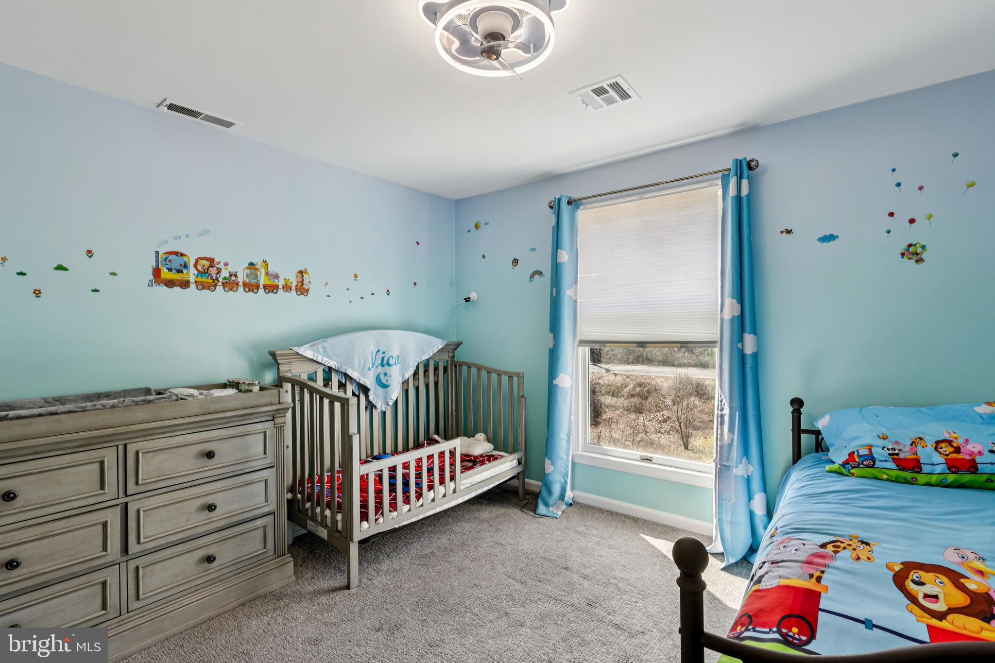 78 Rising Sun Tavern Road Millstone Township, NJ 08510 - Photo 26 of 55 a bedroom with a bed and a window