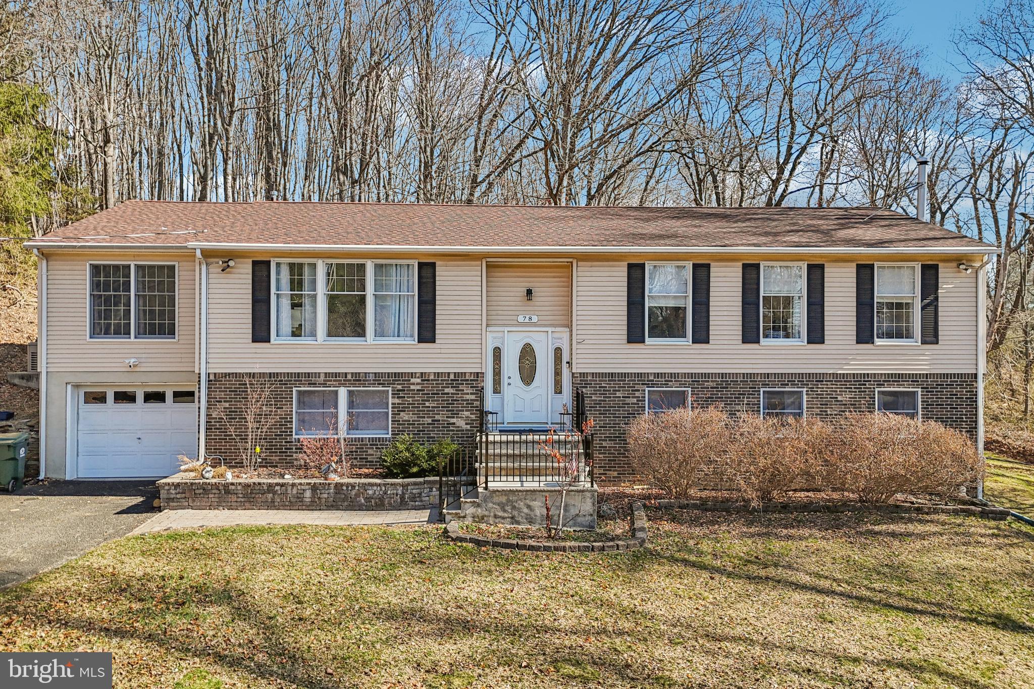 78 Rising Sun Tavern Road Millstone Township, NJ 08510 - Photo 3 of 55 a front view of a house with a yard