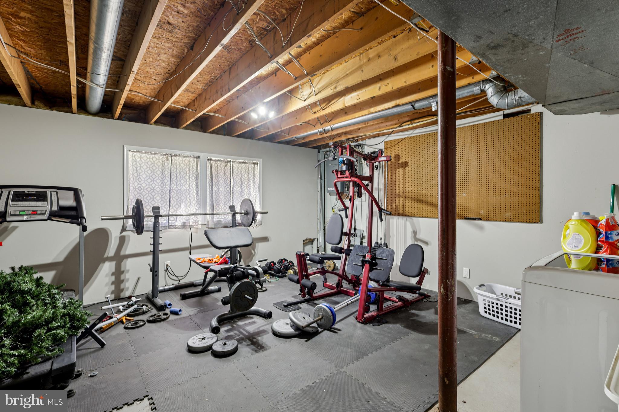 78 Rising Sun Tavern Road Millstone Township, NJ 08510 - Photo 40 of 55 a view of a room with gym equipment