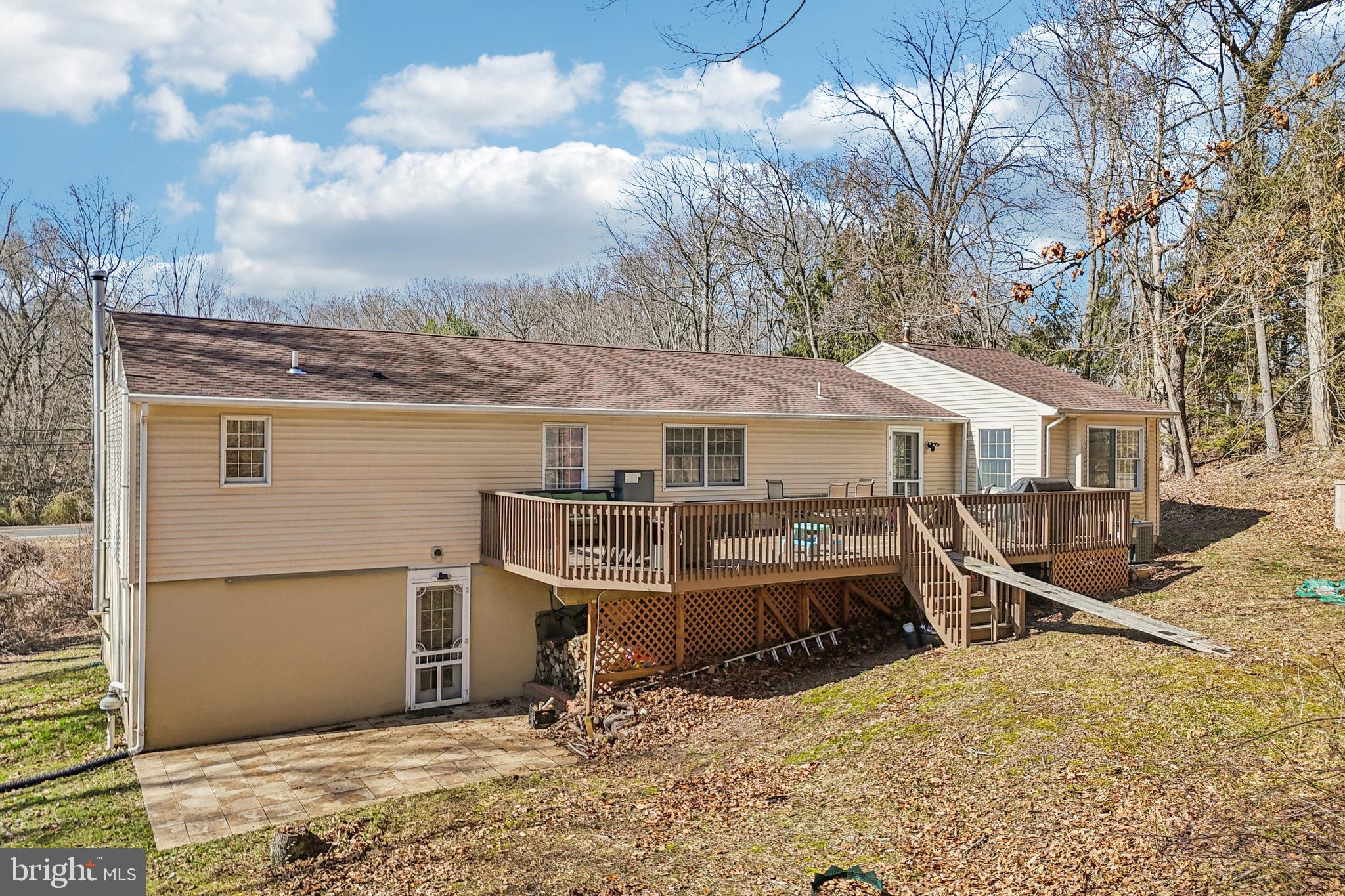 78 Rising Sun Tavern Road Millstone Township, NJ 08510 - Photo 52 of 55 a view of a house with wooden fence