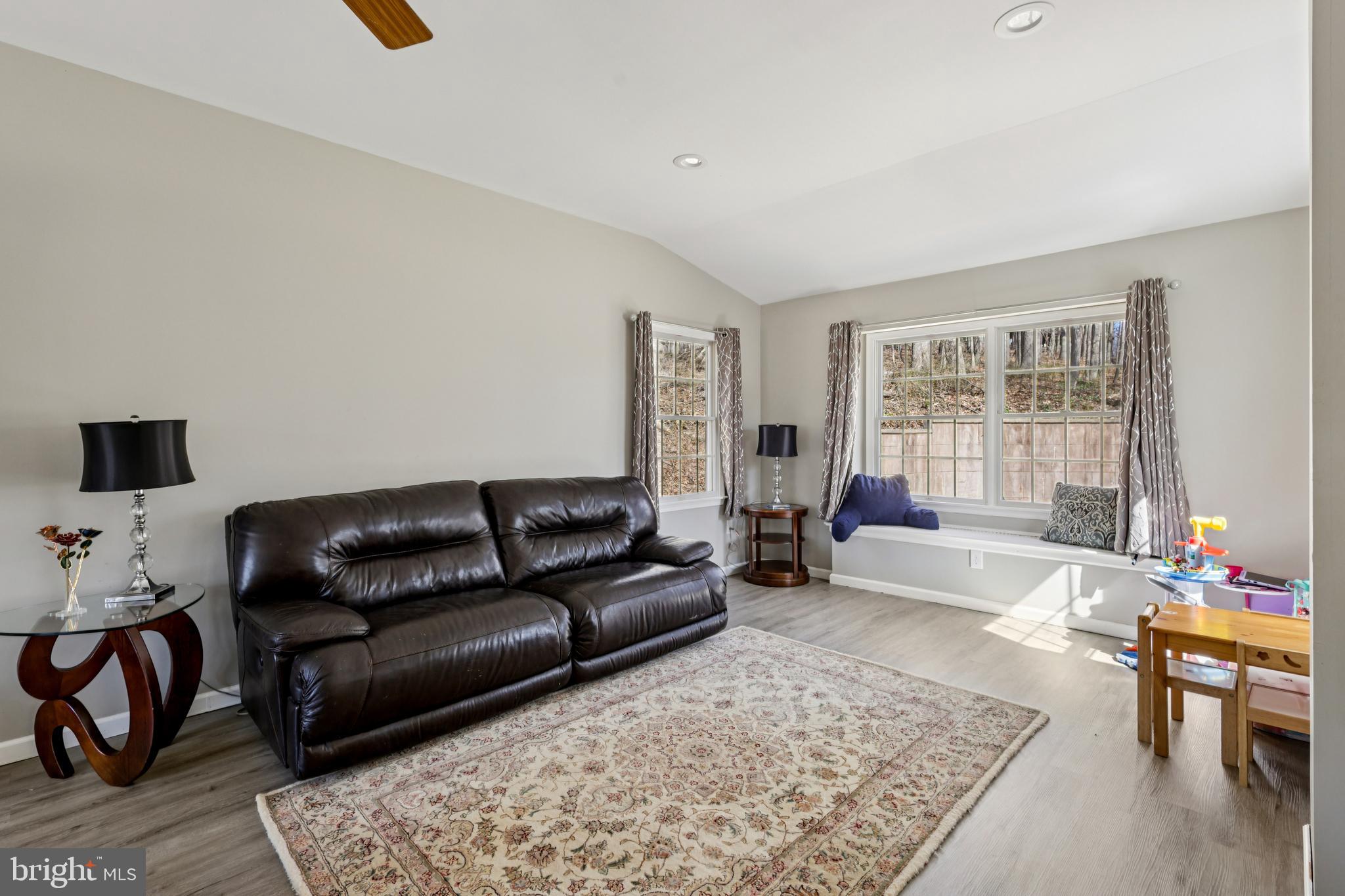 78 Rising Sun Tavern Road Millstone Township, NJ 08510 - Photo 7 of 55 a living room with furniture and a couch