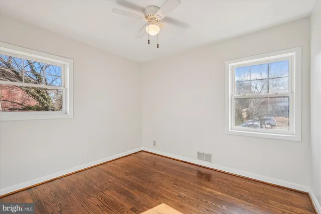 a bathroom with a sink a vanity and a mirror