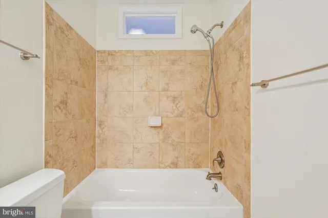 a kitchen with stainless steel appliances granite countertop a sink stove and wooden floor