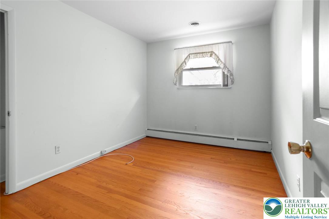 309 Georgetown Road Nazareth, PA 18064 - Photo 14 of 25 an empty room with a window