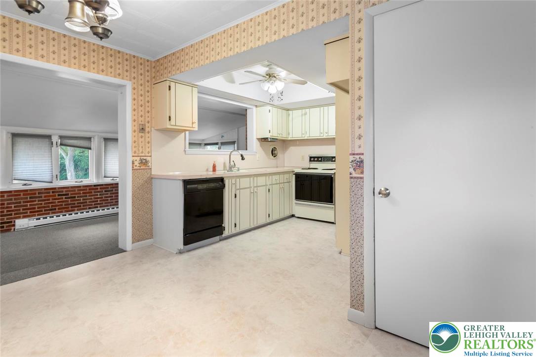309 Georgetown Road Nazareth, PA 18064 - Photo 5 of 25 a kitchen with stainless steel appliances granite countertop a stove and a refrigerator