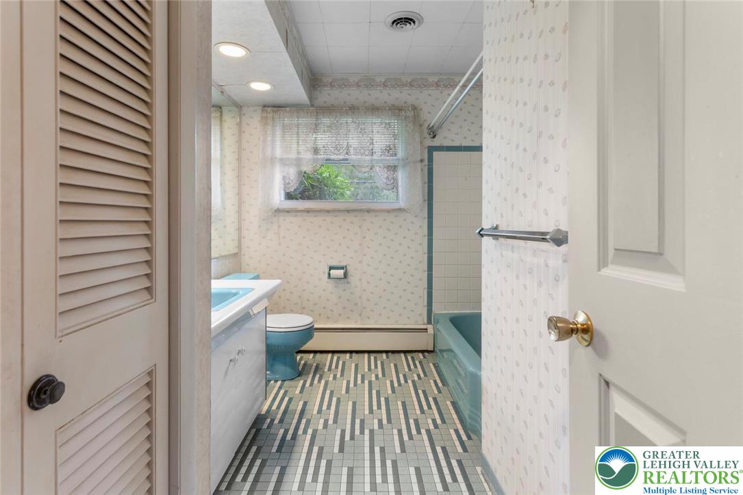 309 Georgetown Road Nazareth, PA 18064 - Photo 9 of 25 a bathroom with a sink and a toilet