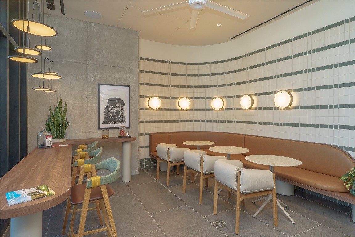 610 Davis Street, Unit 4708 Austin, TX 78701 - Photo 14 of 29 a view of a dining room with furniture and wooden floor
