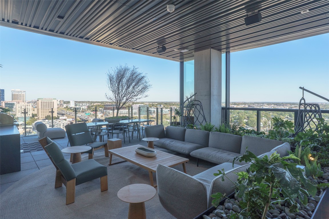 610 Davis Street, Unit 4708 Austin, TX 78701 - Photo 15 of 29 a patio with patio couch and outdoor seating
