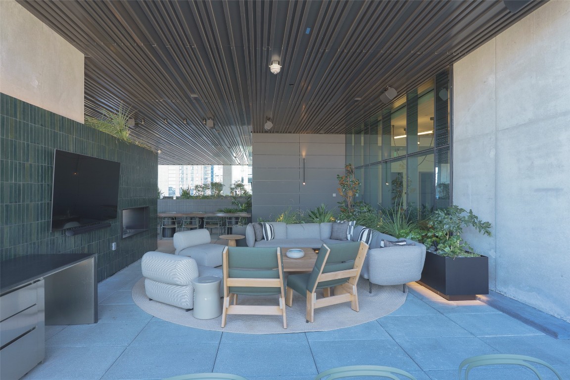 610 Davis Street, Unit 4708 Austin, TX 78701 - Photo 17 of 29 a outdoor space with lots of tables and chairs