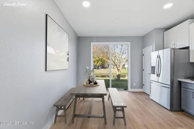 a bathroom with a shower a toilet and a bathtub