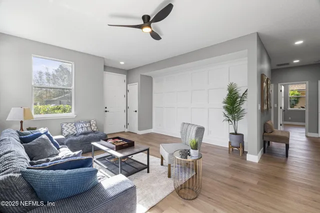 a kitchen with stainless steel appliances granite countertop a sink and a stove