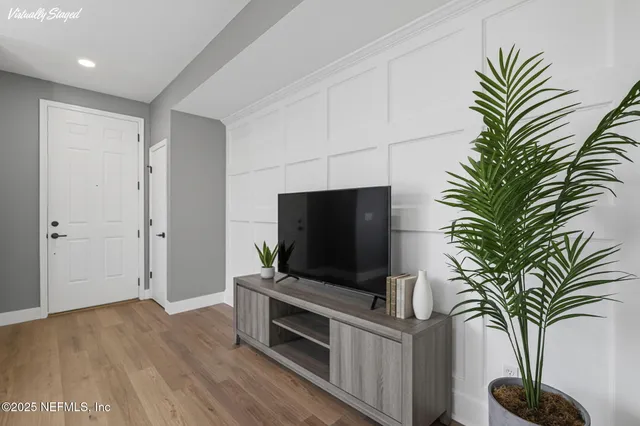 a kitchen with stainless steel appliances granite countertop a stove a refrigerator and a sink