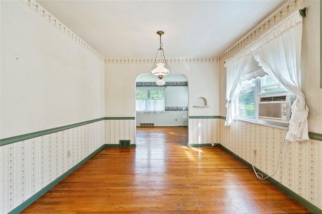 1268 Old State Road Apollo, PA 15613 - Photo 19 of 22 a view of a room with wooden floor windows and entryway