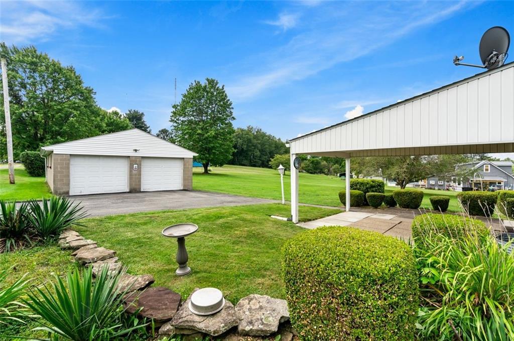 1268 Old State Road Apollo, PA 15613 - Photo 2 of 22 a house view with a garden space