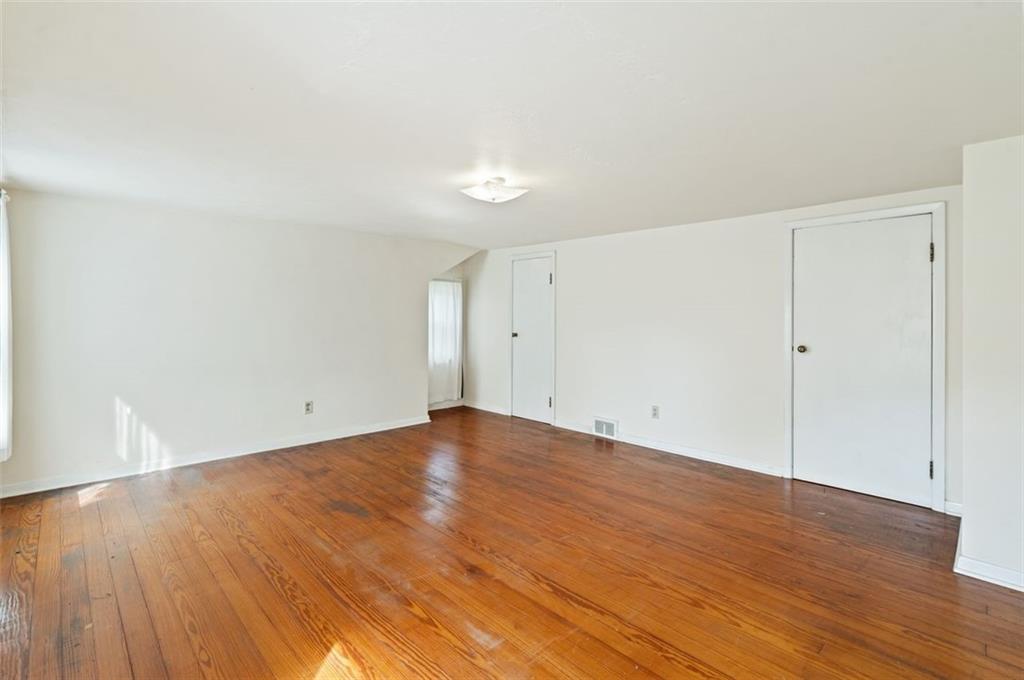 1268 Old State Road Apollo, PA 15613 - Photo 10 of 22 a view of an empty room with wooden floor