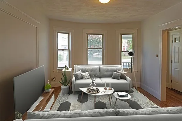 a living room with furniture and a window