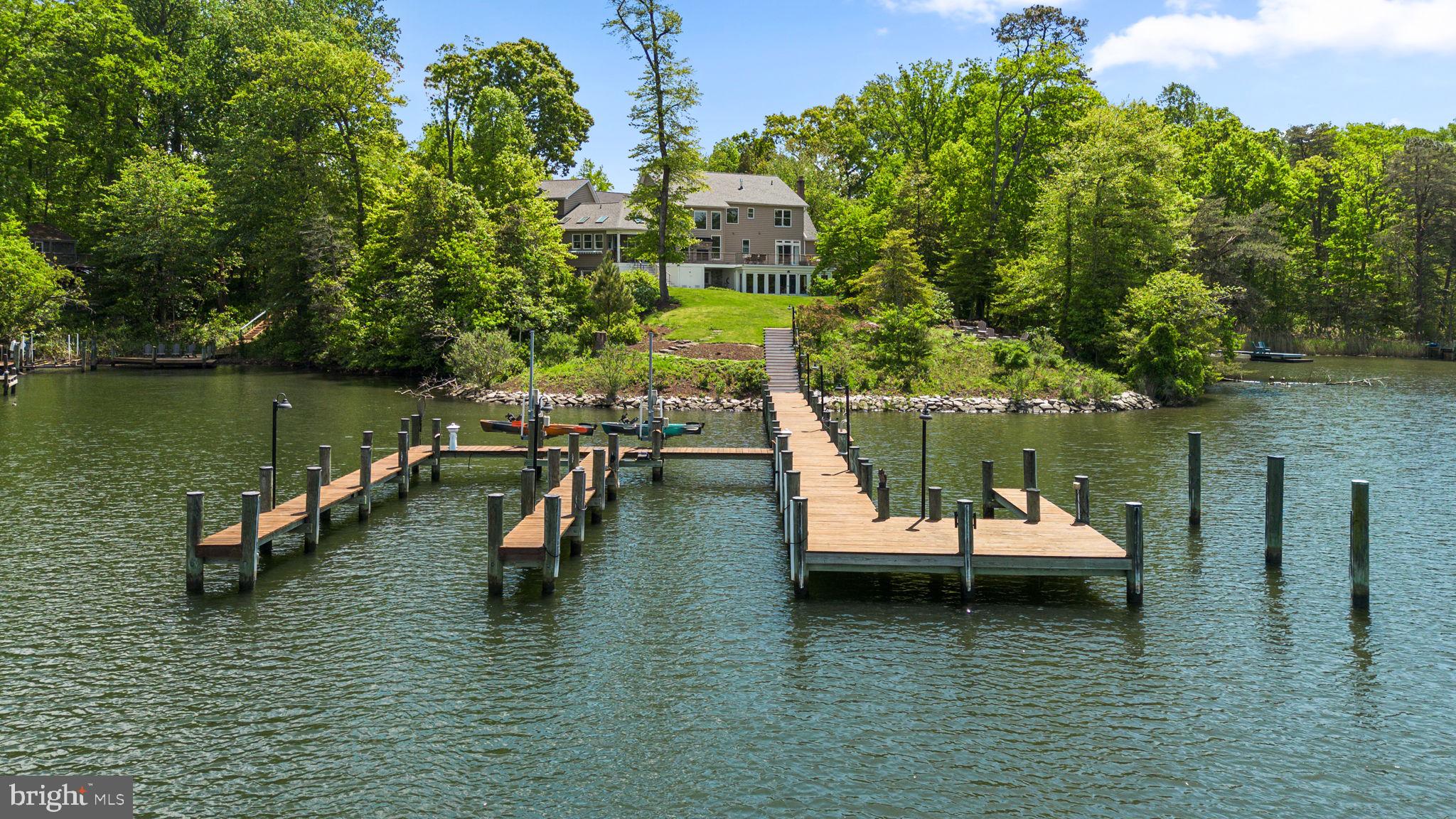798 Creek View Road Severna Park, MD 21146 - Photo 64 of 72 an aerial view of a house with swimming pool and lake view