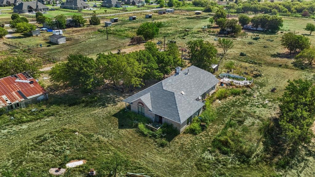 7331 Faught Road Argyle, TX 76226 - Photo 13 of 22 Bird's eye view of outbuildings and house