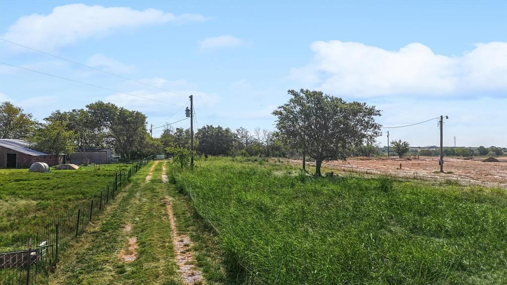 7331 Faught Road Argyle, TX 76226 - Photo 2 of 22 View of yard featuring a rural view