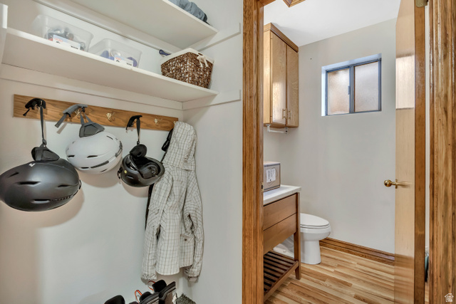 887 Village Way Alpine, UT 84004 - Photo 20 of 28 Half bathroom featuring light wood-style flooring and vanity