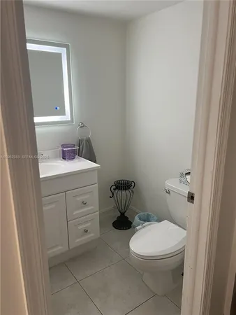 a room with a table and chairs