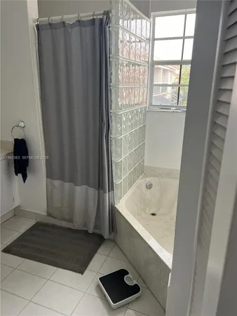 a bed room with a bed and a dresser