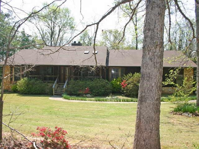 161 Scarborough Road Stockbridge, GA 30281 - Photo 1 of 1 a view of house with backyard and garden