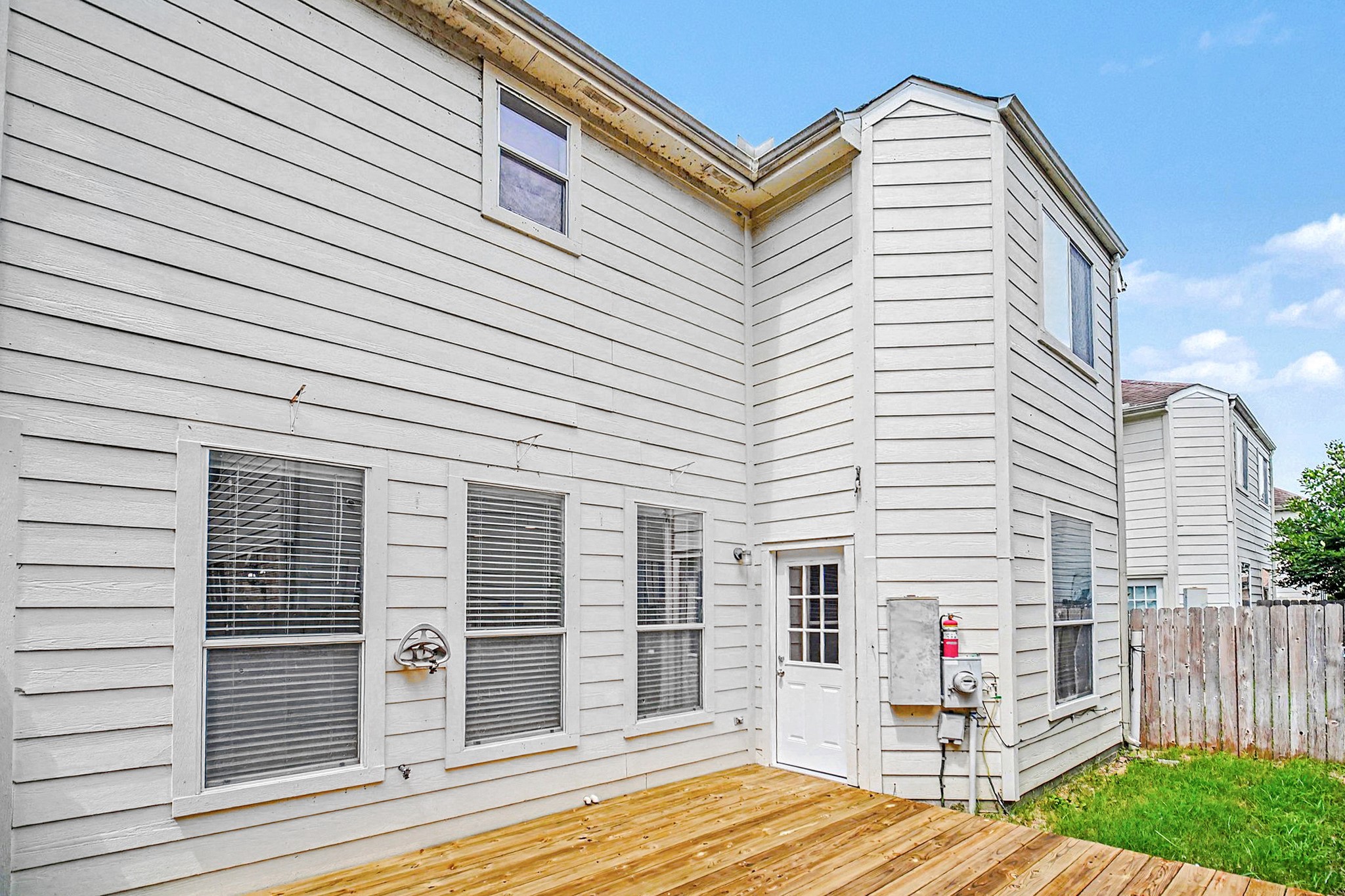 7419 Hollister Ridge Houston, TX 77040 - Photo 23 of 27 Large backyard with deck is perfect for entertaining.