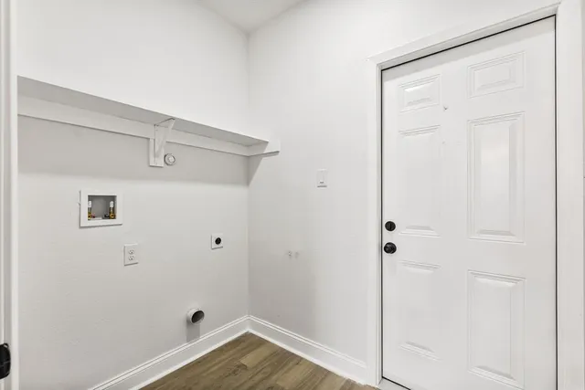 a view of room with hardwood floor