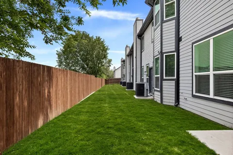 a view of a back yard of the house