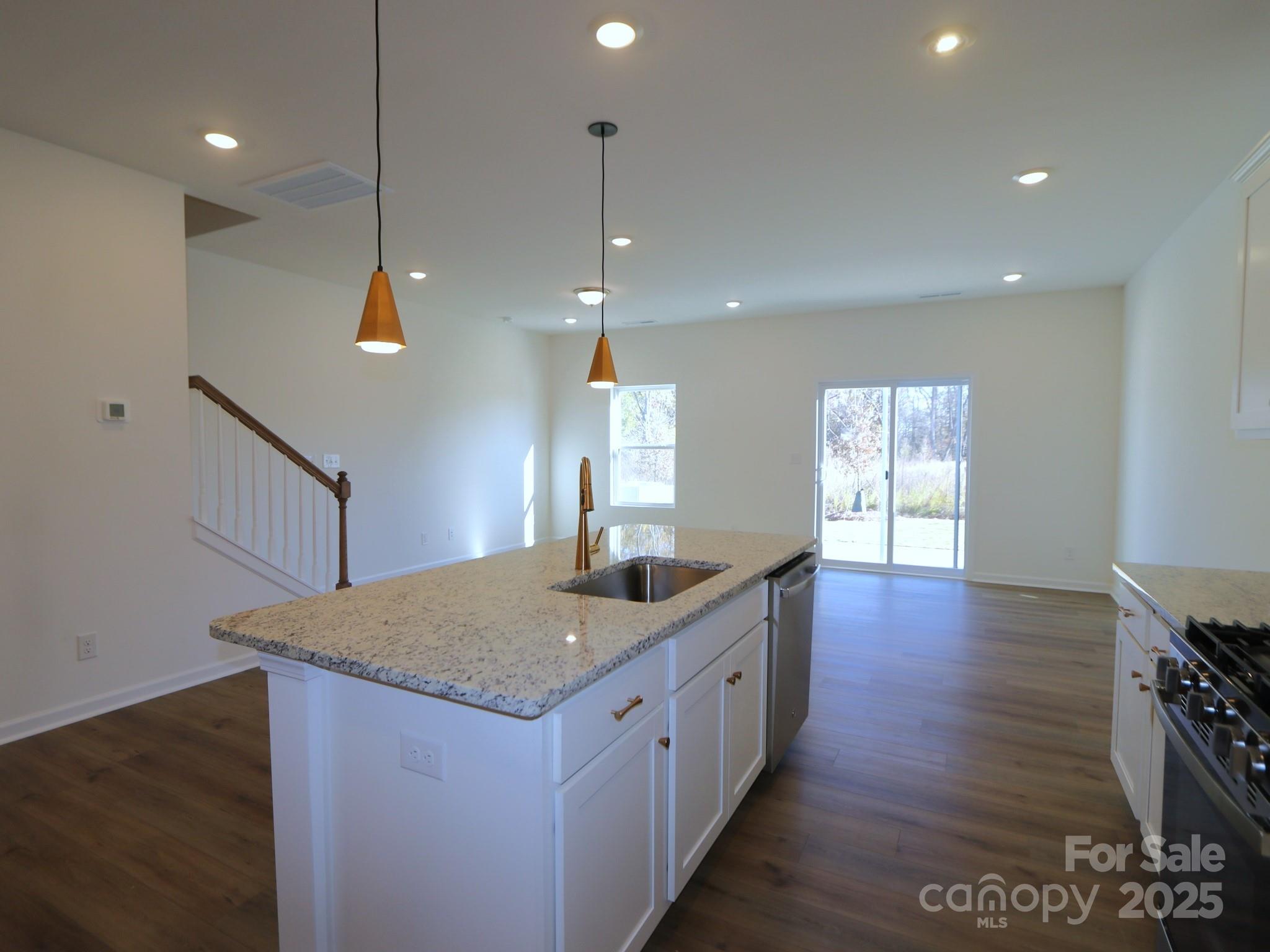 759 Kitfox Drive Northwest Concord, NC 28027 - Photo 5 of 19 a kitchen with sink and window