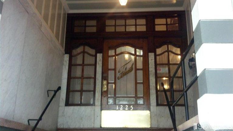 1225 Pine Street San Francisco, CA 94109 - Photo 2 of 4 Entry door of the Falmouth Apartments.