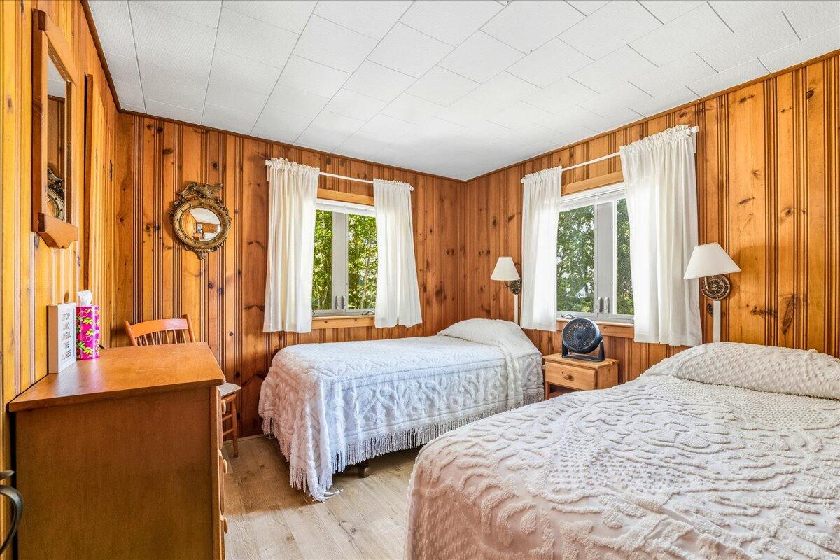 42 Kim Path Mashpee, MA 02649 - Photo 12 of 30 a bedroom with two beds and a large window