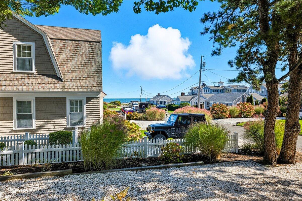 42 Kim Path Mashpee, MA 02649 - Photo 3 of 30 a view of a house with a garden
