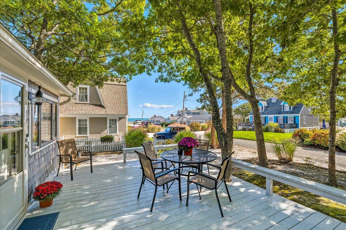 42 Kim Path Mashpee, MA 02649 - Photo 4 of 30 an outdoor space with seating