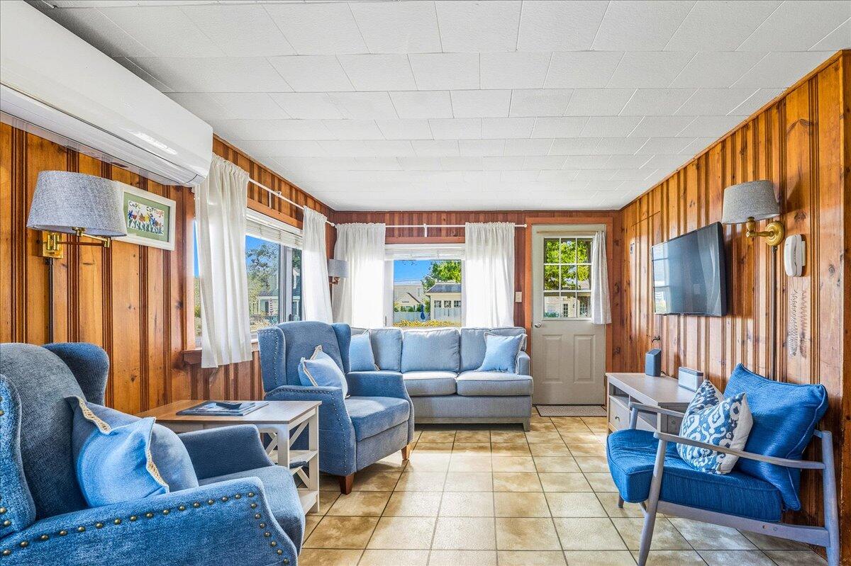 42 Kim Path Mashpee, MA 02649 - Photo 6 of 30 a living room with furniture and large windows