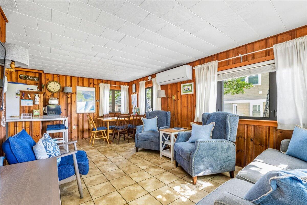 42 Kim Path Mashpee, MA 02649 - Photo 7 of 30 a living room with furniture and large windows