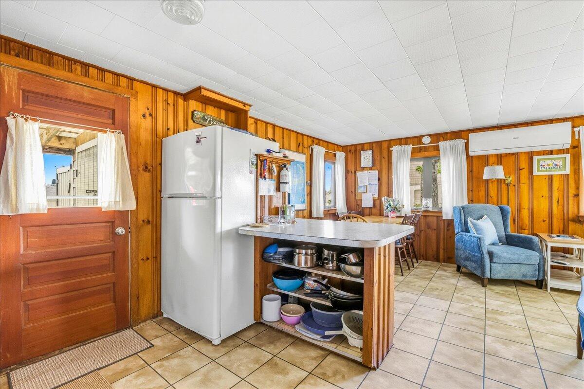42 Kim Path Mashpee, MA 02649 - Photo 10 of 30 a kitchen with stainless steel appliances granite countertop a refrigerator and a stove