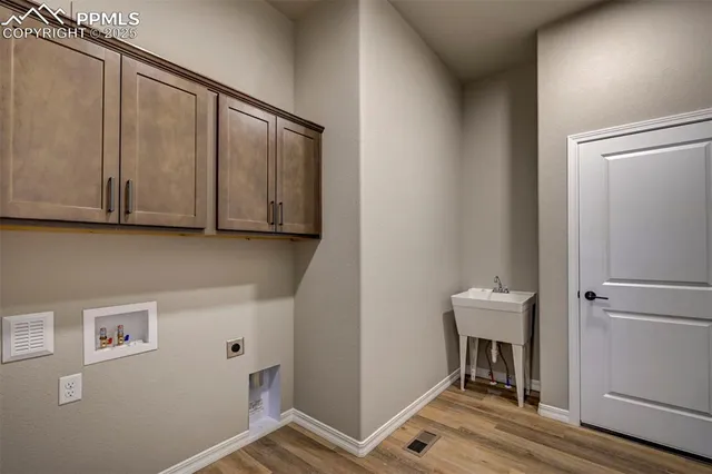 a view of cabinets with wooden floor and cabinet