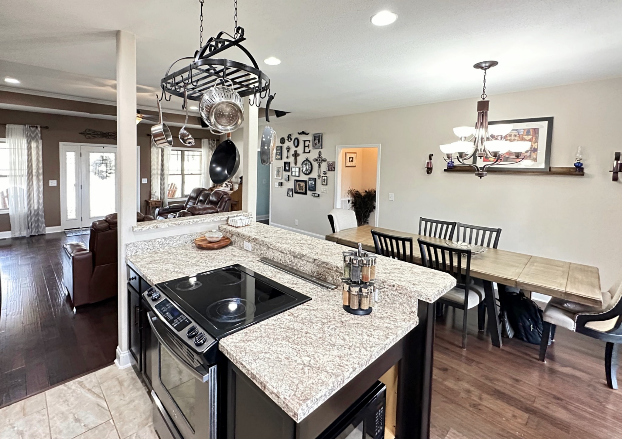 1815 Broome Road Palmyra, TN 37142 - Photo 21 of 61 a kitchen with a table chairs and wooden floor